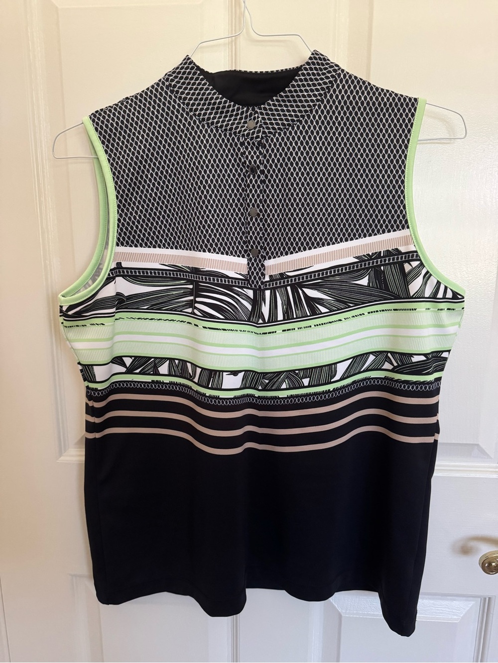 Beautiful TAIL golf top size large. EUC. Black/green/white.